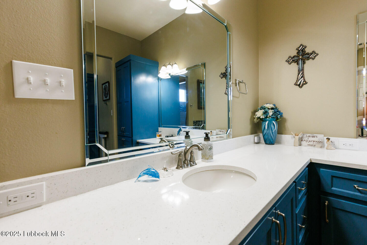 6611 Tiger Ropesville, TX 79358 - Photo 60 of 102 a bathroom with a sink and a mirror