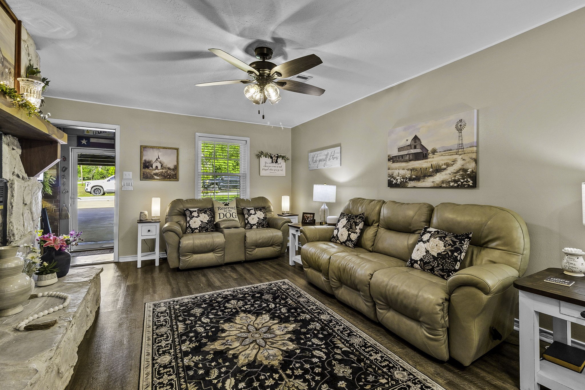 188 Huckleberry Road Onalaska, TX 77360 - Photo 7 of 49 a living room with furniture and a chandelier