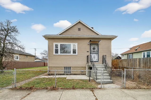 a front view of a house with garage