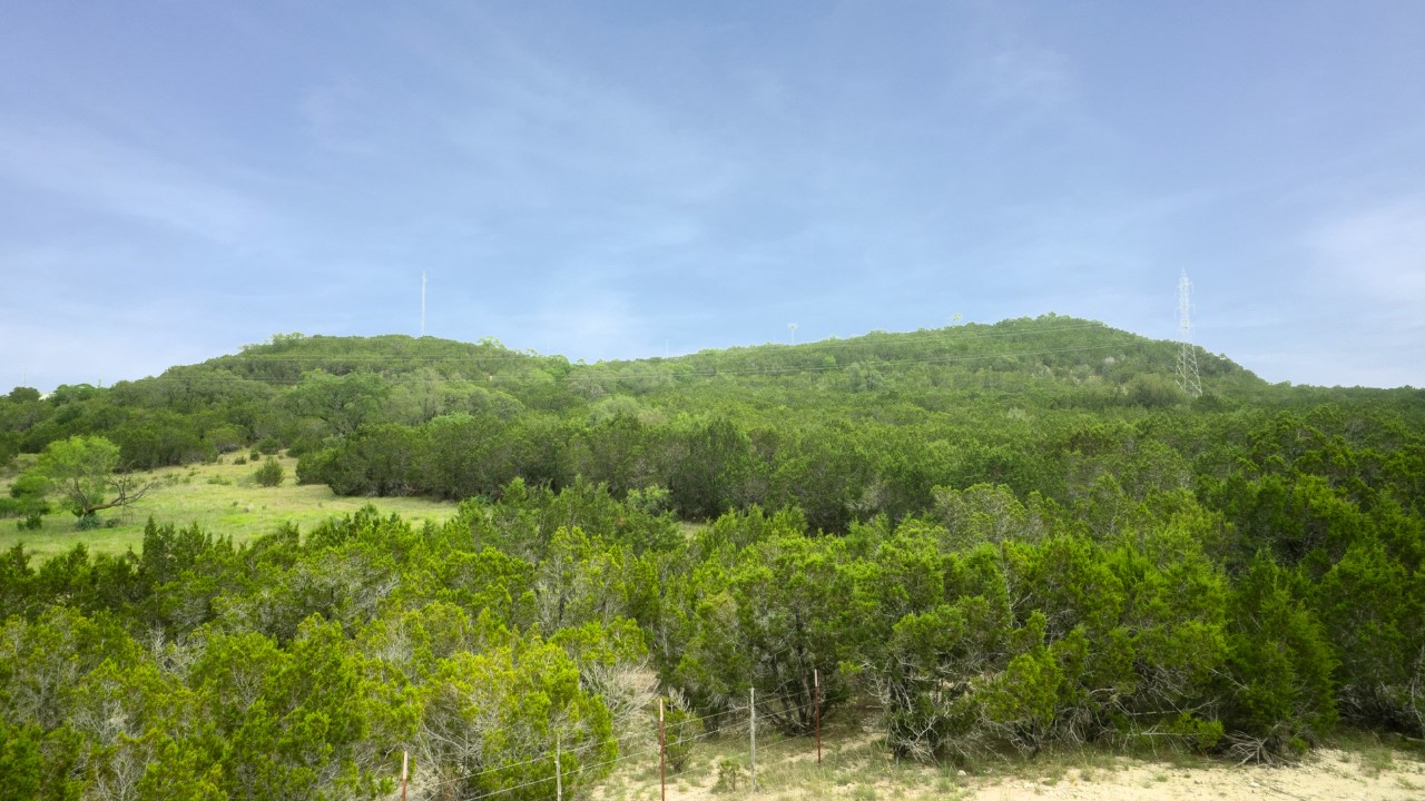 251 Post Mountain Road Burnet, TX 78611 - Photo 4 of 5 a view of a green field