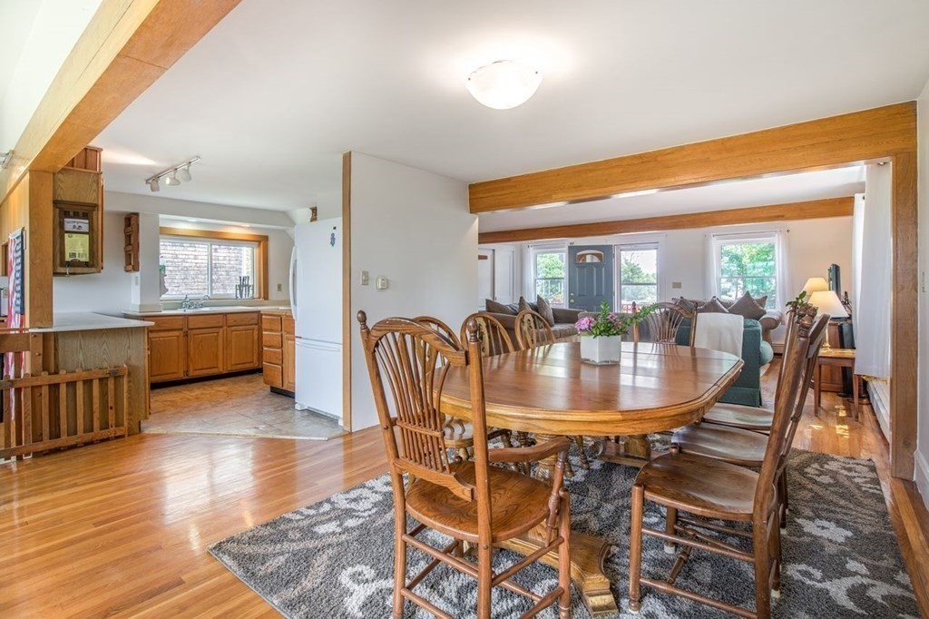 23 Cliff Road Gloucester, MA 01930 - Photo 11 of 37 a dining room with furniture and wooden floor