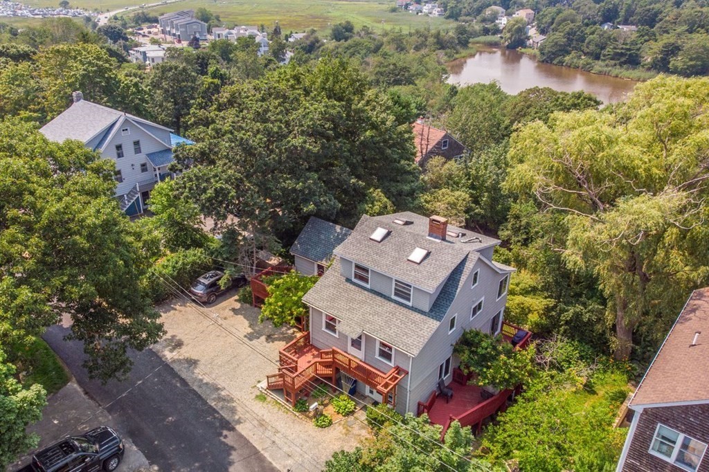 23 Cliff Road Gloucester, MA 01930 - Photo 2 of 37 an aerial view of a house with a yard