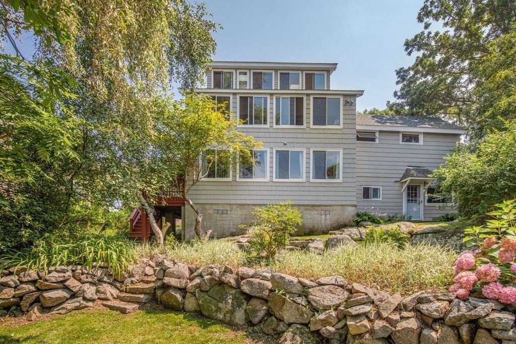 23 Cliff Road Gloucester, MA 01930 - Photo 35 of 37 a front view of a house with a yard
