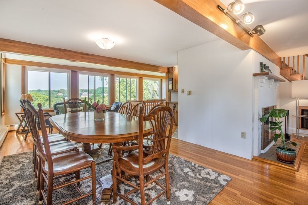 23 Cliff Road Gloucester, MA 01930 - Photo 10 of 37 a dining room with furniture and wooden floor