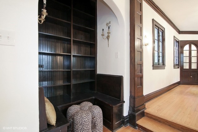 192 Park Avenue Glencoe, IL 60022 - Photo 5 of 24 a room with a chair and a fireplace