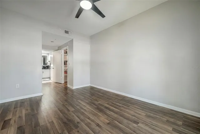 a bed room with a bed and a chandelier