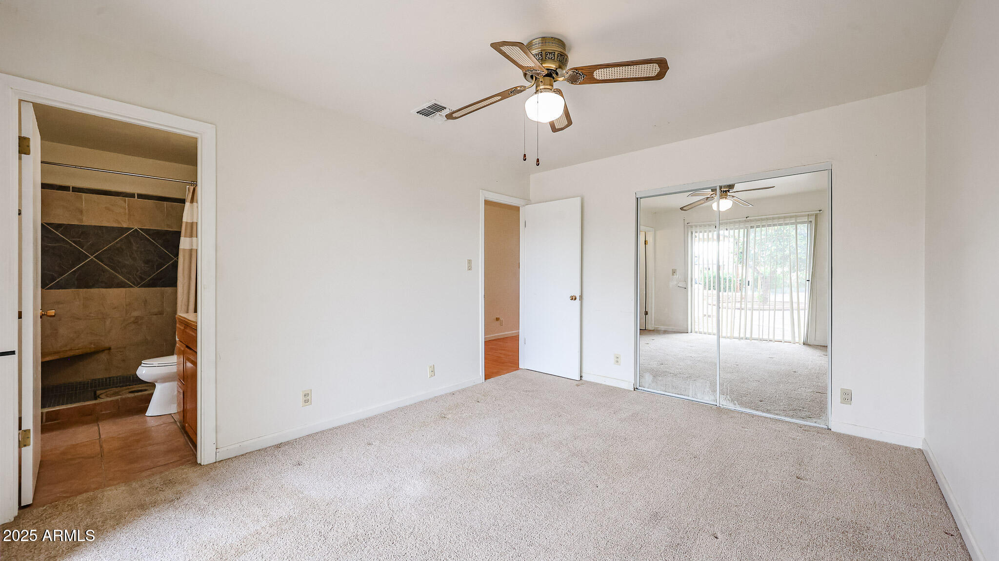 11851 North Thunderbird Road Sun City, AZ 85351 - Photo 27 of 46 a view of an empty room with a bathroom