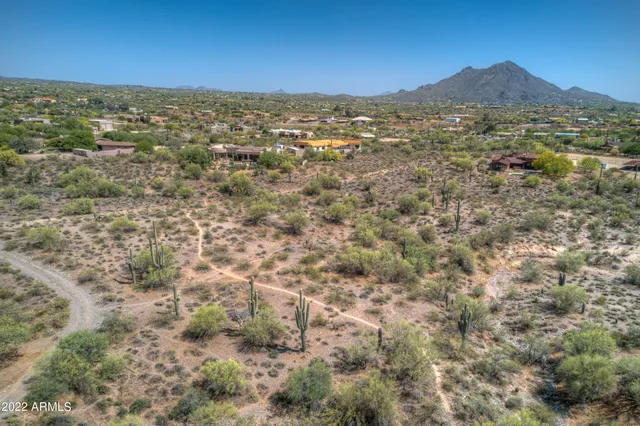 a view of a city with mountain