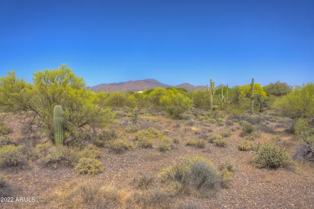 a view of mountain view with mountains in the background