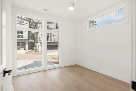 an empty room with shelves