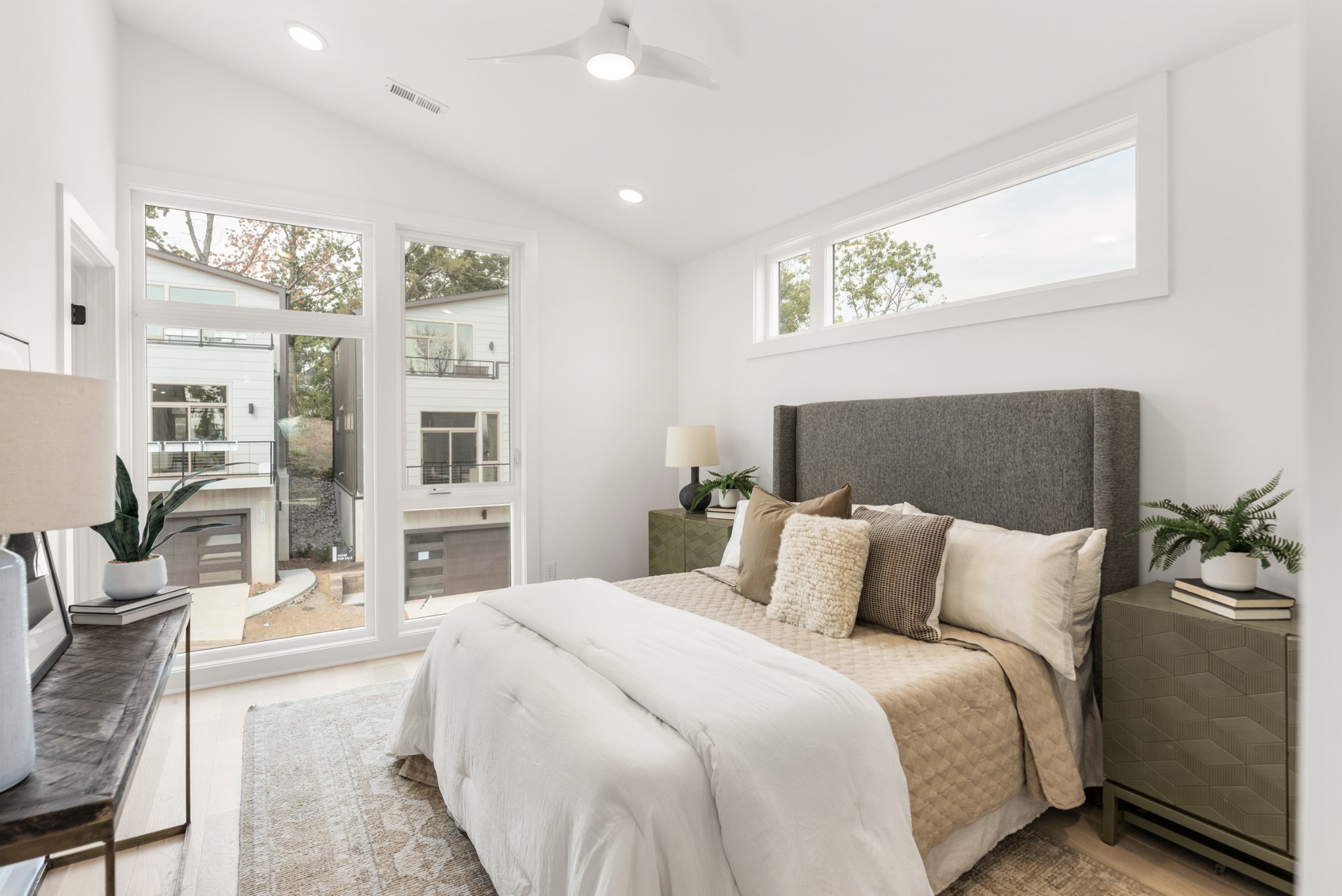 3026 Edwin Street Nashville, TN 37207 - Photo 27 of 48 a bedroom with a large bed and a night stand