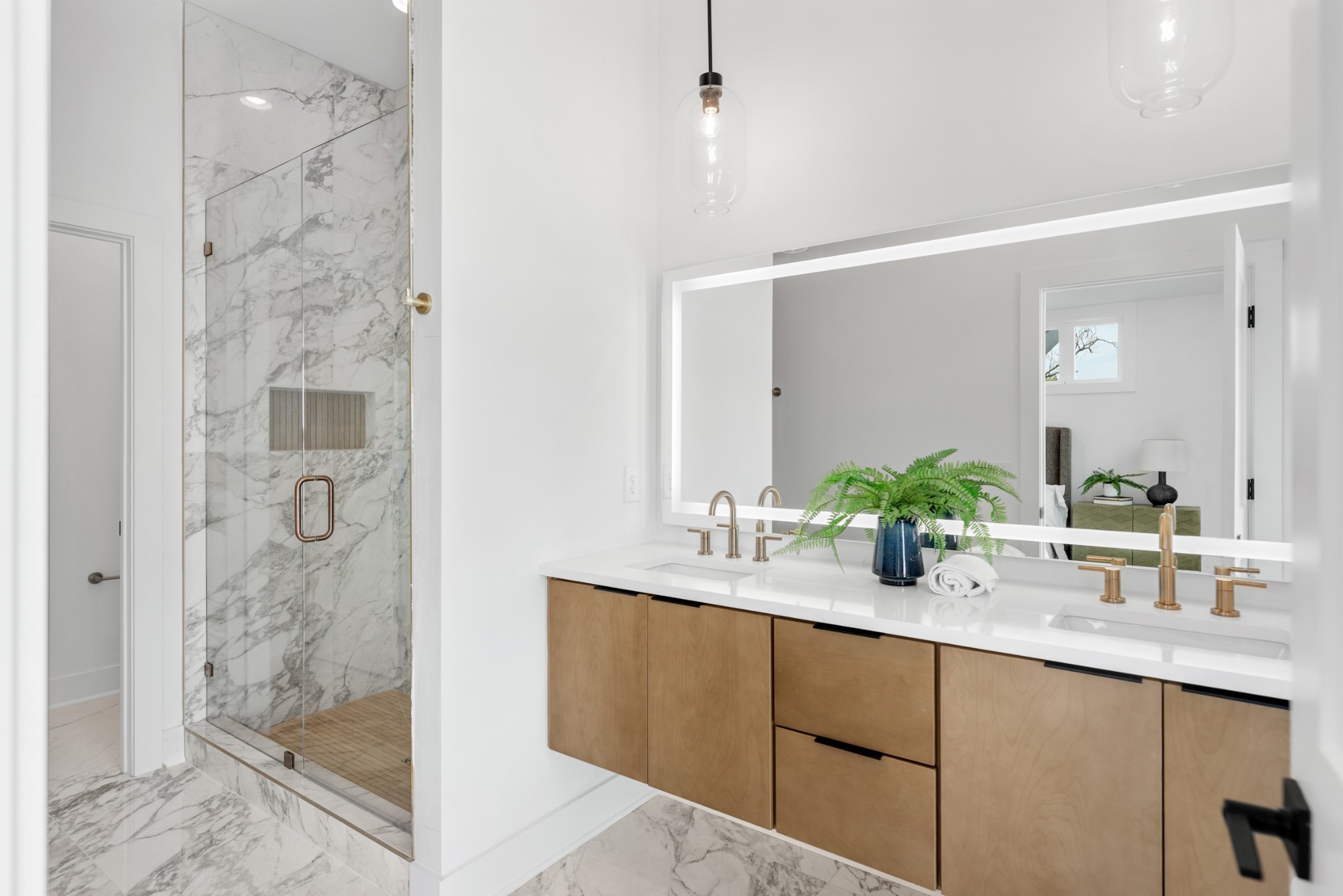 3026 Edwin Street Nashville, TN 37207 - Photo 30 of 48 a bathroom with a shower sink and mirror