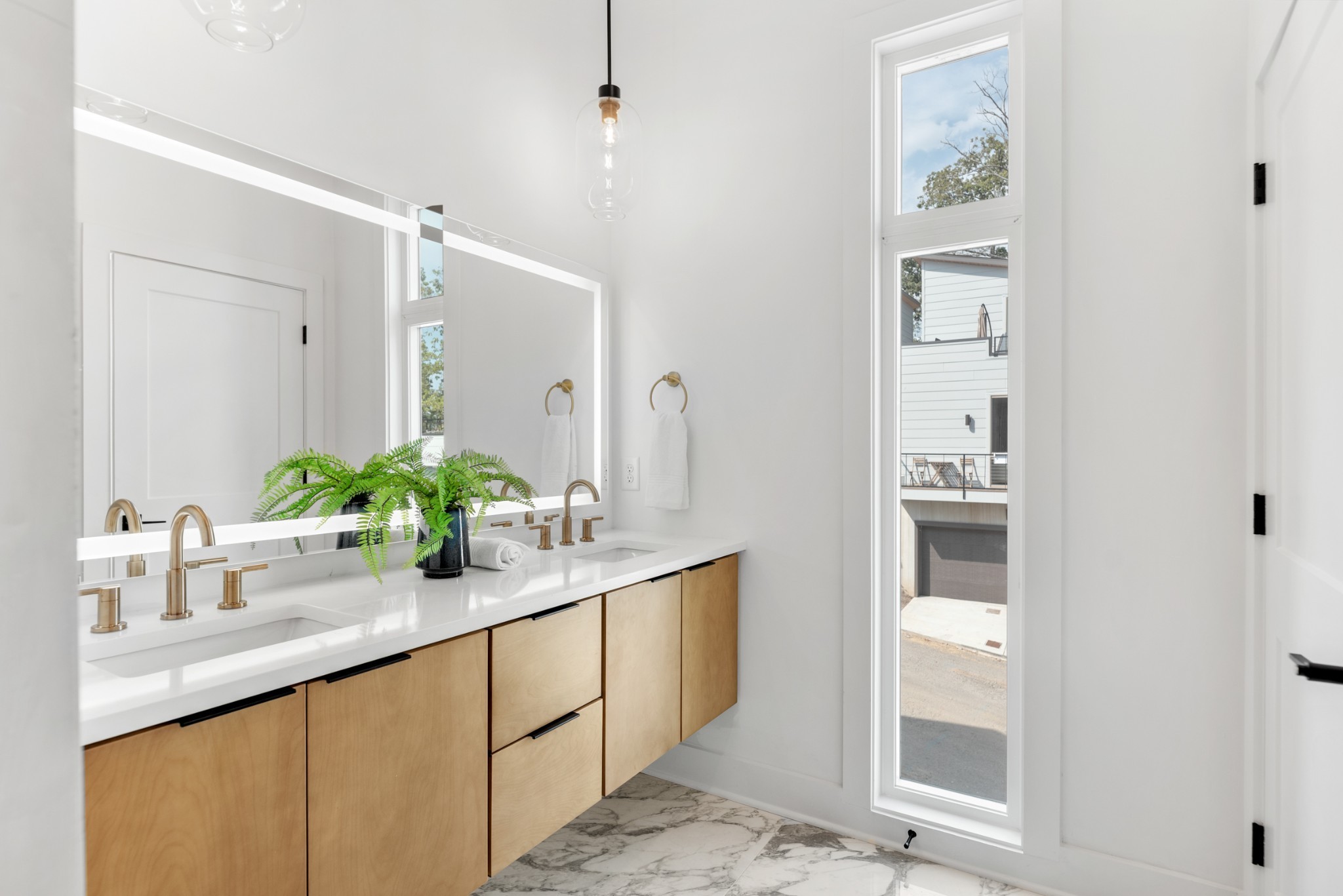 3026 Edwin Street Nashville, TN 37207 - Photo 31 of 48 a bathroom with a sink and a mirror