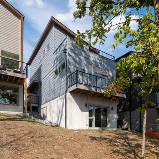 a view of a house with a iron gate