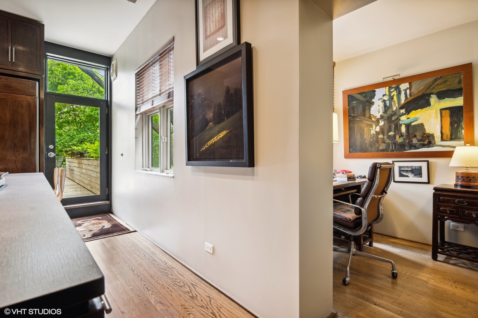 24 East Division Street Chicago, IL 60610 - Photo 23 of 52 a view of a workspace with furniture and a window
