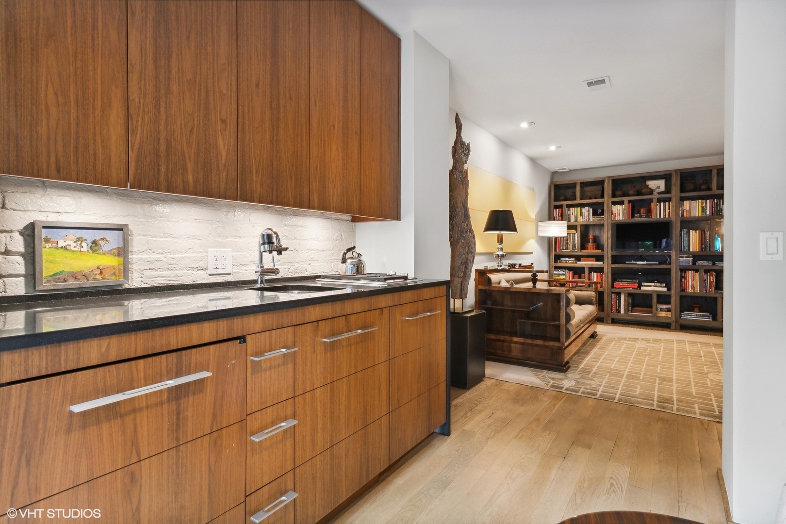 24 East Division Street Chicago, IL 60610 - Photo 39 of 52 a kitchen with stainless steel appliances granite countertop a refrigerator a sink dishwasher stove and oven