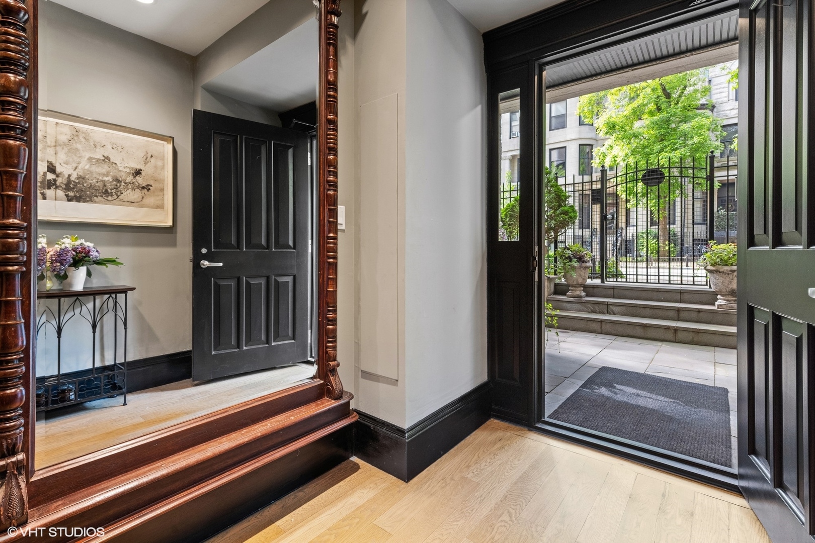 24 East Division Street Chicago, IL 60610 - Photo 4 of 52 a view of a entryway door of the room and living room