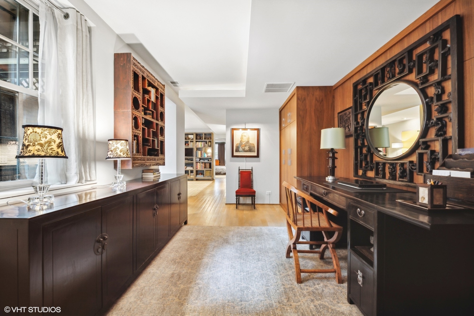 24 East Division Street Chicago, IL 60610 - Photo 41 of 52 a view of a kitchen with dining table and chairs