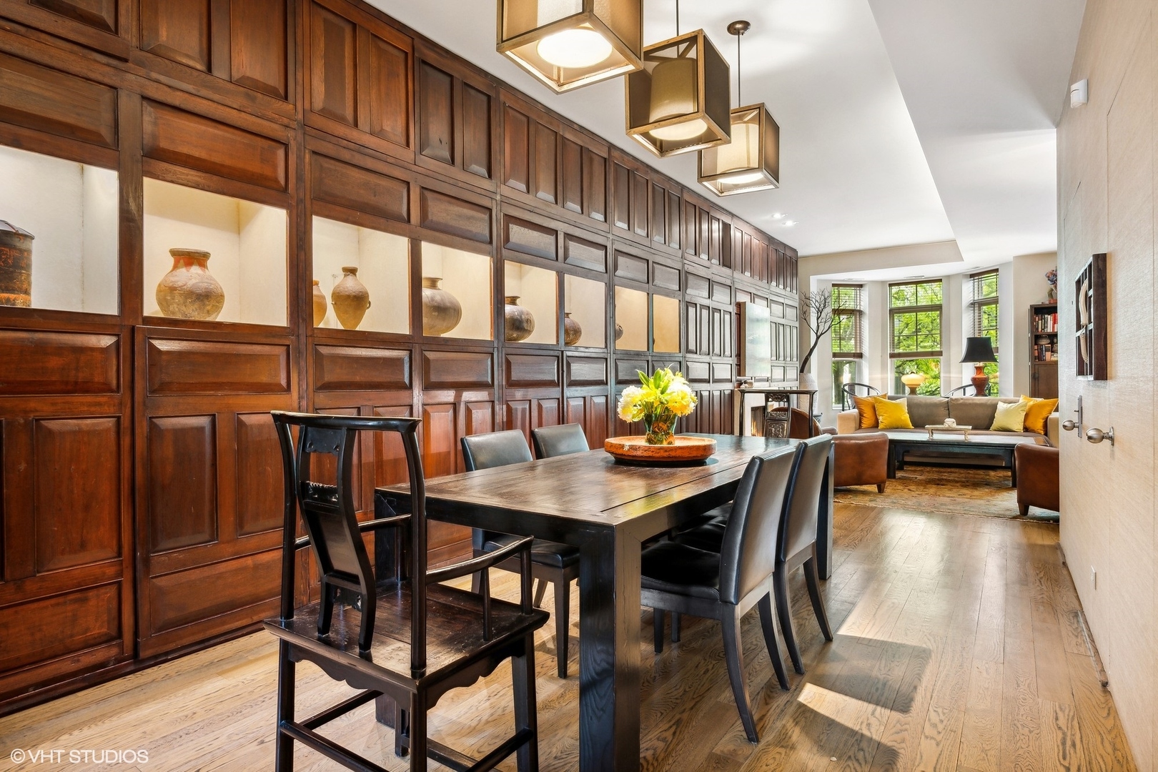 24 East Division Street Chicago, IL 60610 - Photo 44 of 52 a dining room with furniture and a floor to ceiling window