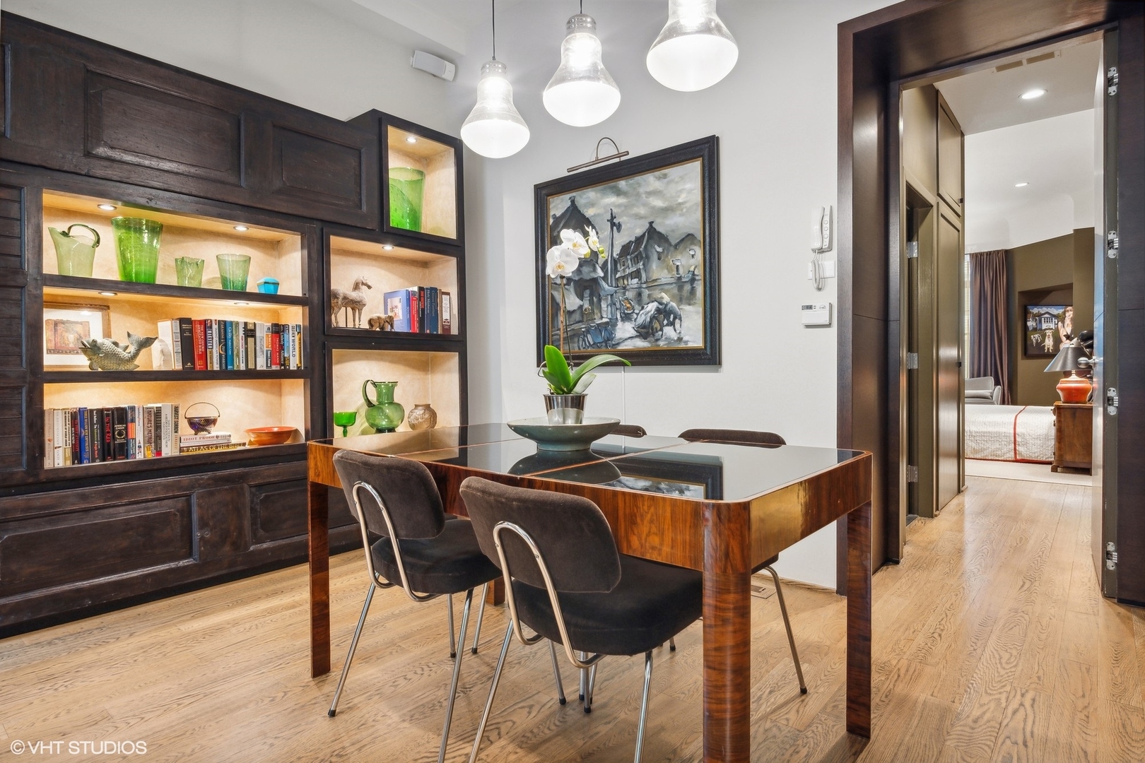 24 East Division Street Chicago, IL 60610 - Photo 10 of 52 a view of a dining room with furniture window and wooden floor