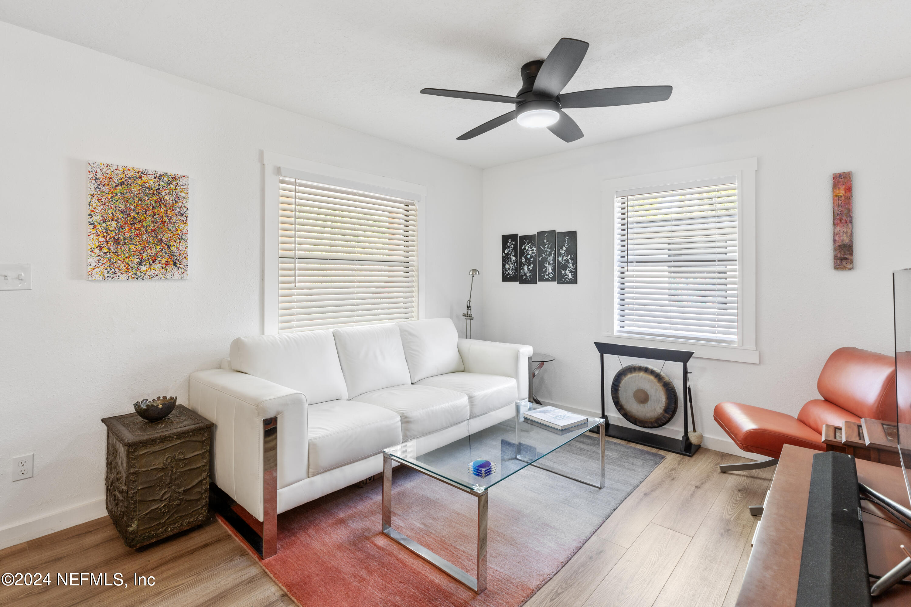1067 Cahoon Road South Jacksonville, FL 32221 - Photo 6 of 21 a living room with furniture a window and a window