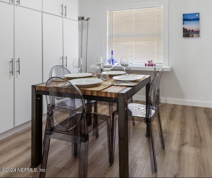 1067 Cahoon Road South Jacksonville, FL 32221 - Photo 8 of 21 a view of a dining table and chairs in the patio