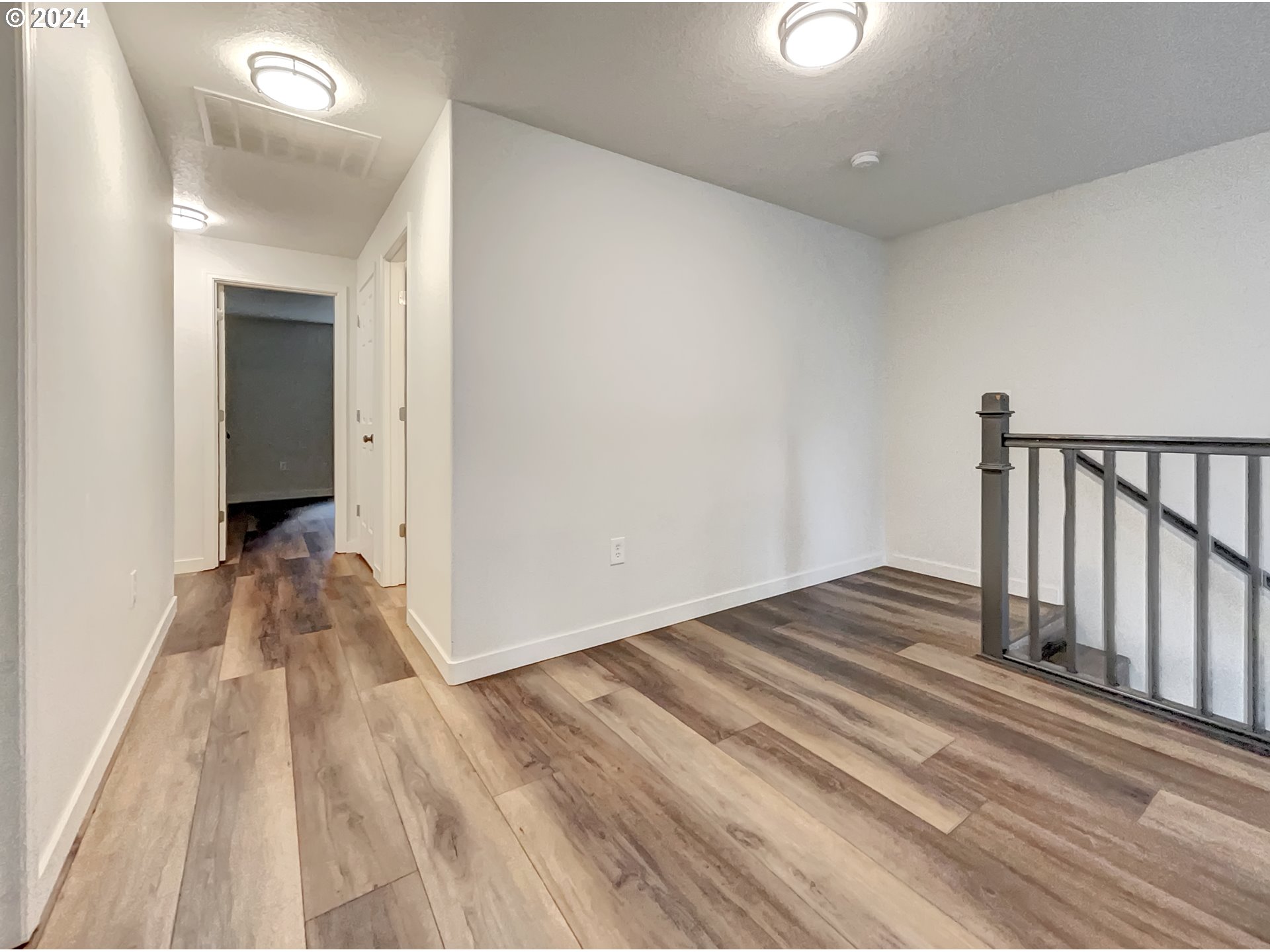2933 South Cedar Ridge Drive Ridgefield, WA 98642 - Photo 14 of 21 a view of a room with wooden floor