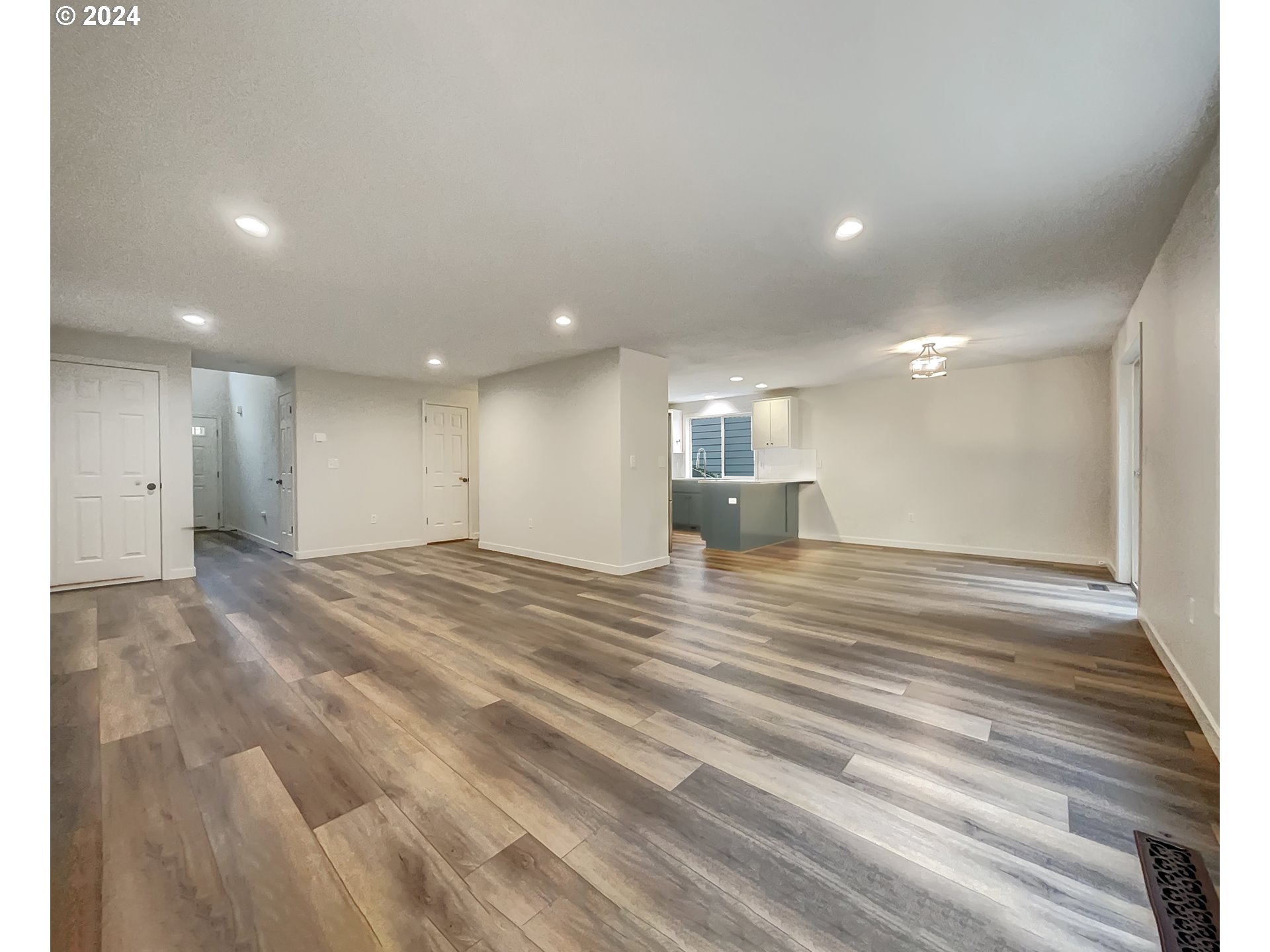 2933 South Cedar Ridge Drive Ridgefield, WA 98642 - Photo 19 of 21 a view of kitchen and empty room