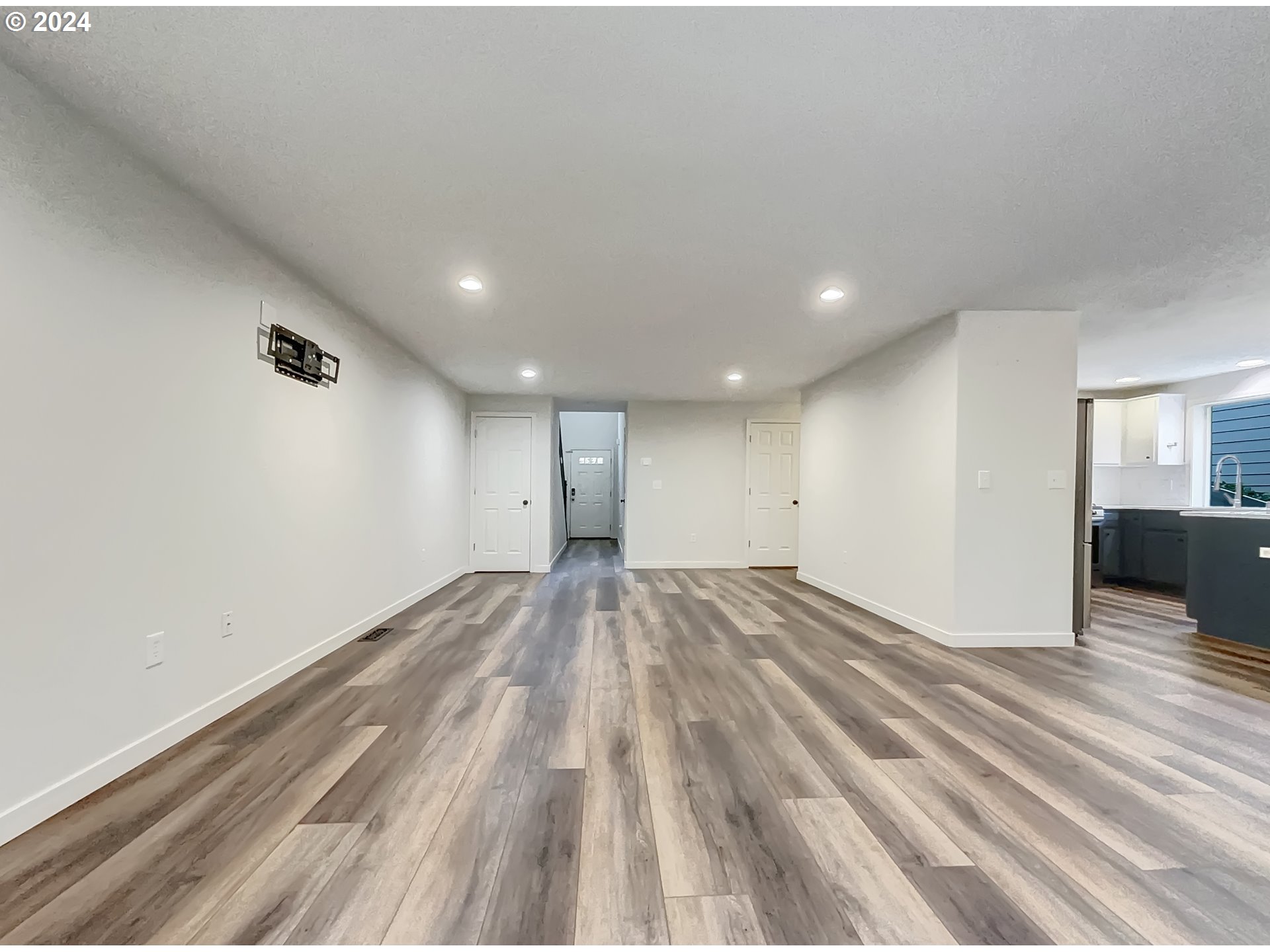 2933 South Cedar Ridge Drive Ridgefield, WA 98642 - Photo 3 of 21 a view of empty room with wooden floor