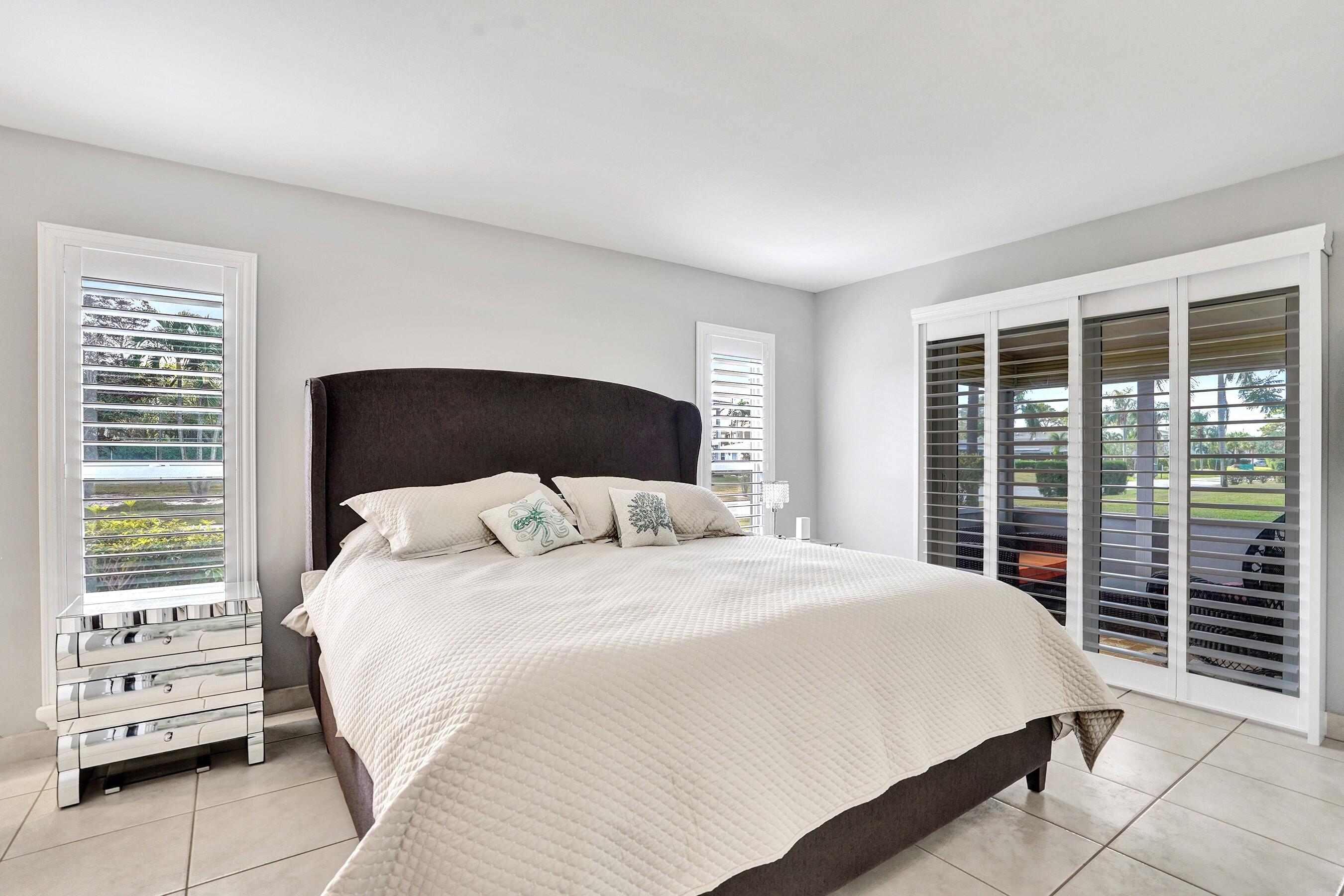 1435 Southwest 27th Avenue, Unit 101 Delray Beach, FL 33445 - Photo 12 of 59 MASTER BEDROOM