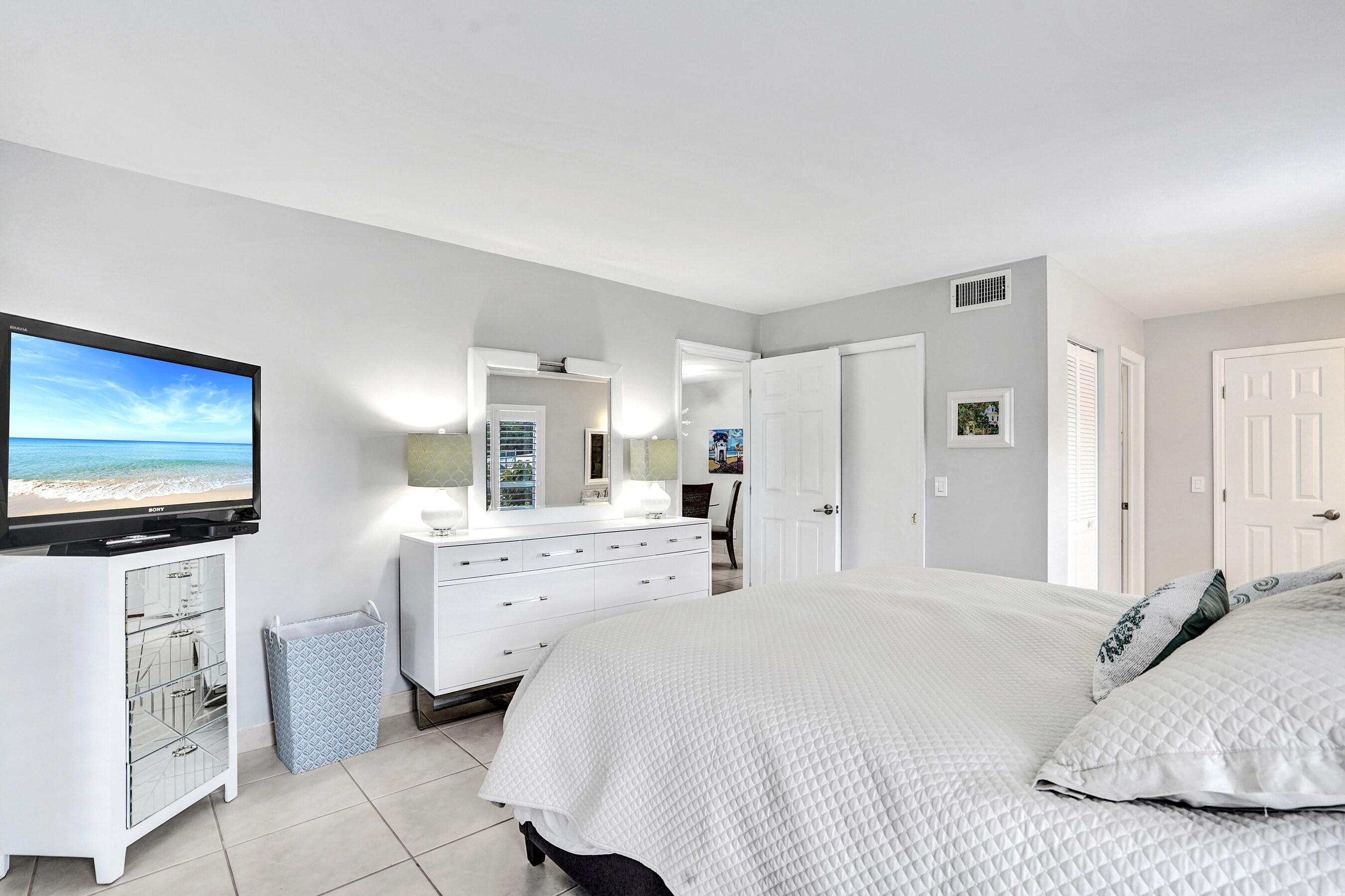 1435 Southwest 27th Avenue, Unit 101 Delray Beach, FL 33445 - Photo 13 of 59 MASTER BEDROOM