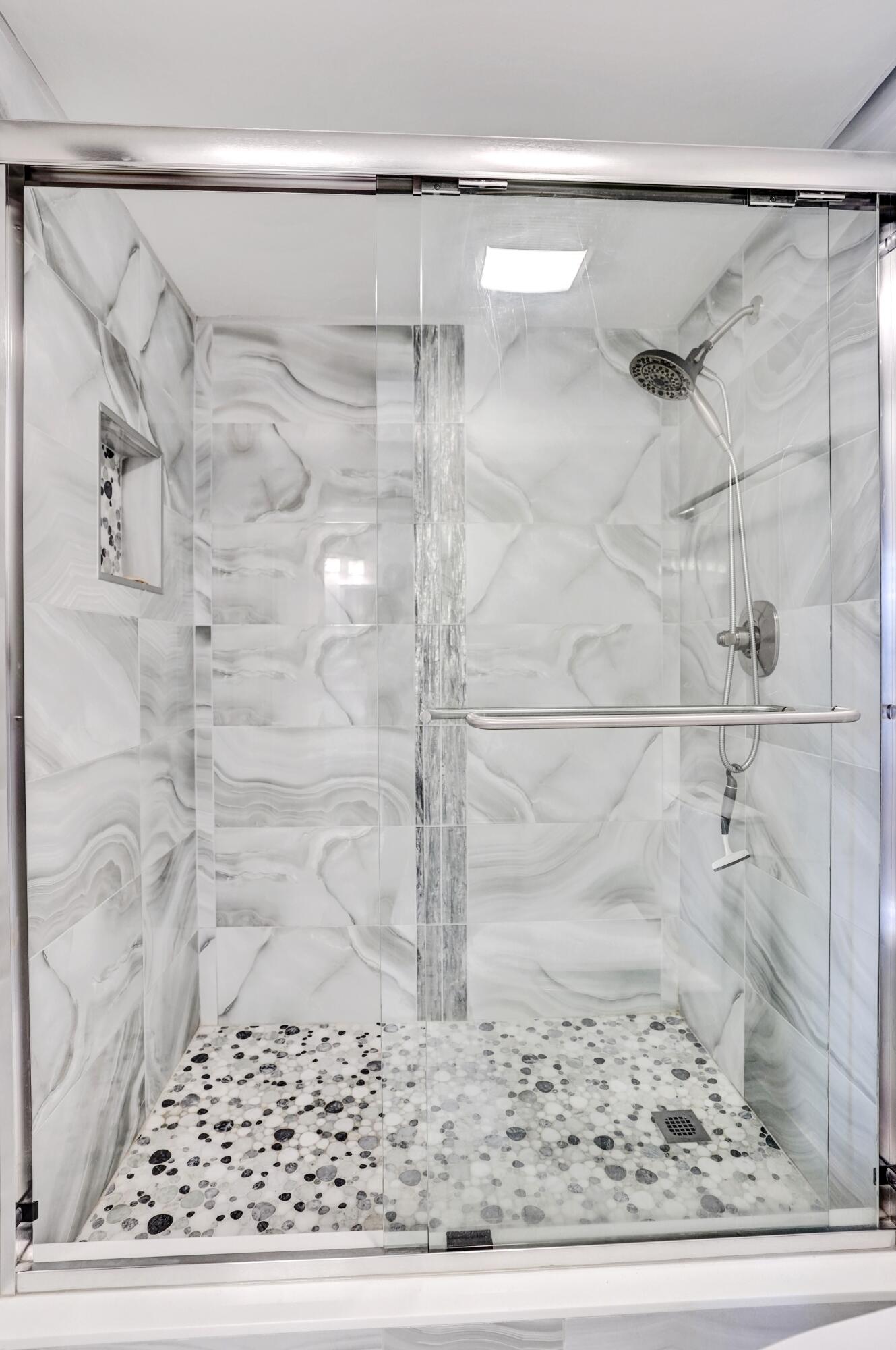 1435 Southwest 27th Avenue, Unit 101 Delray Beach, FL 33445 - Photo 16 of 59 MASTER WALK-IN SHOWER