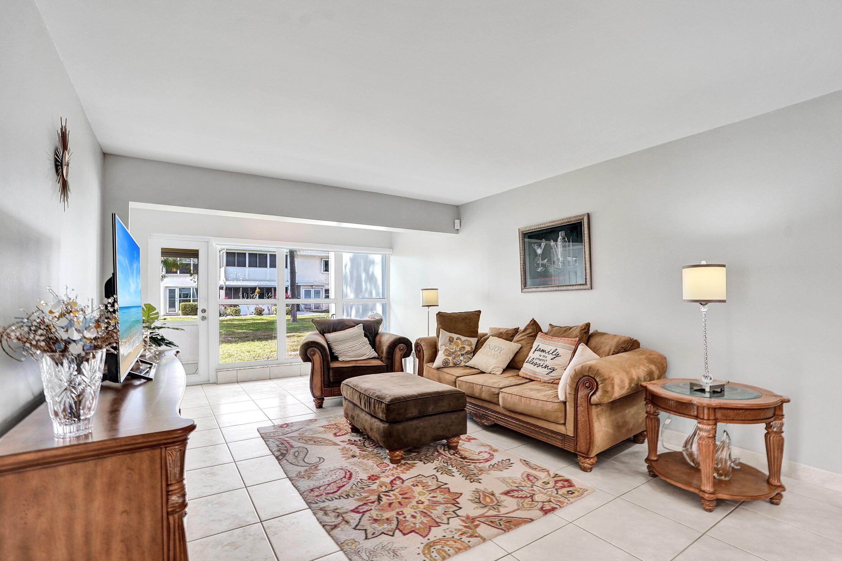 1435 Southwest 27th Avenue, Unit 101 Delray Beach, FL 33445 - Photo 29 of 59 LIVING ROOM