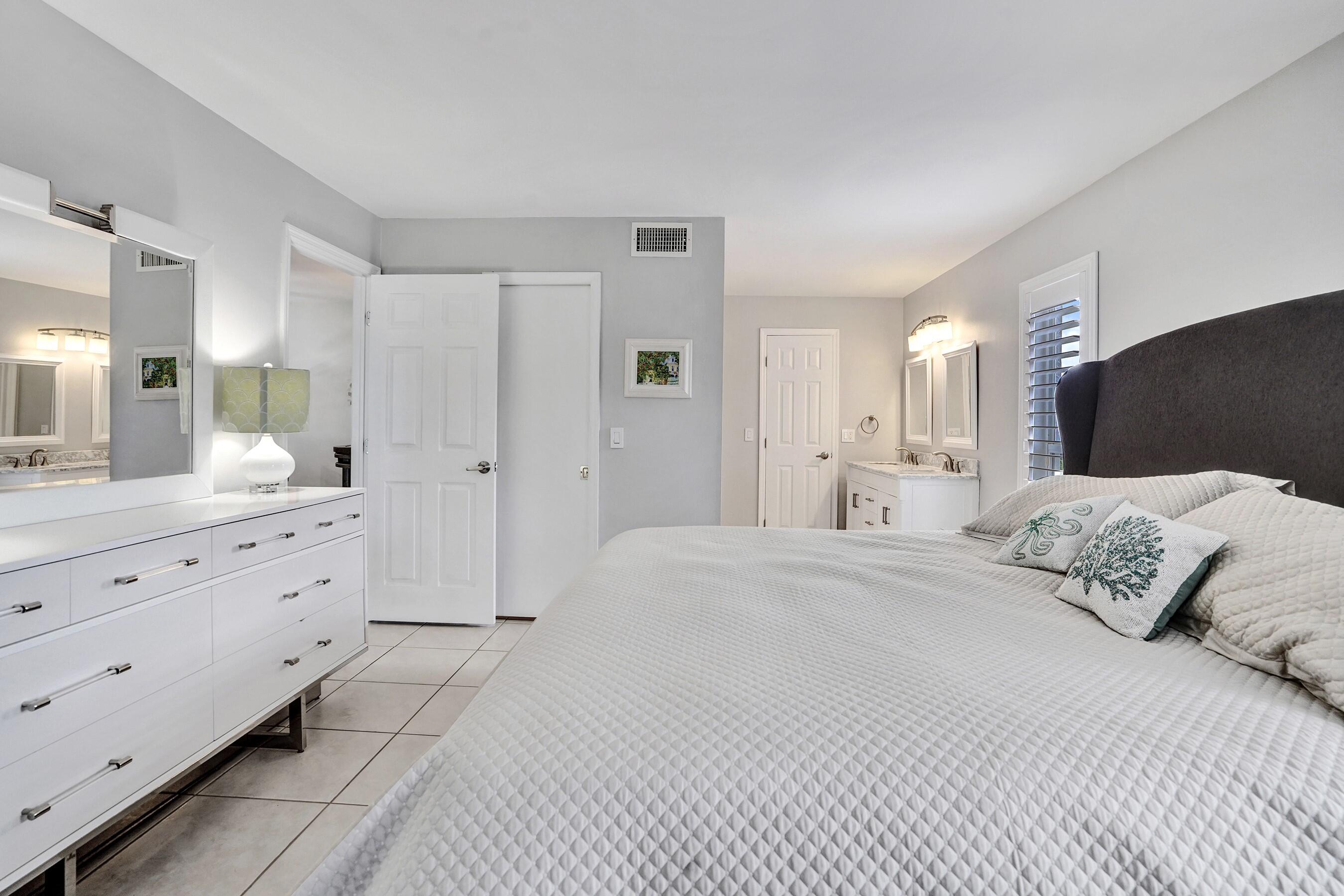 1435 Southwest 27th Avenue, Unit 101 Delray Beach, FL 33445 - Photo 34 of 59 MASTER BEDROOM