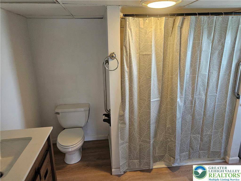 23 West Ruddle Street Coaldale, PA 18218 - Photo 8 of 16 a bathroom with a toilet and shower