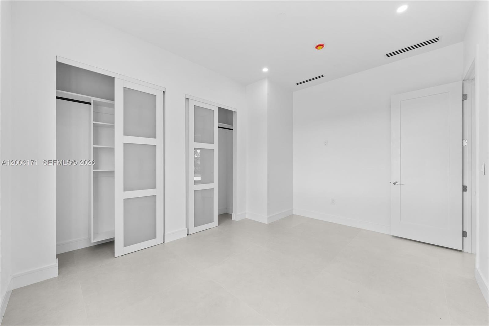 29705 Southwest 187th Avenue Homestead, FL 33030 - Photo 20 of 55 a view of an empty room