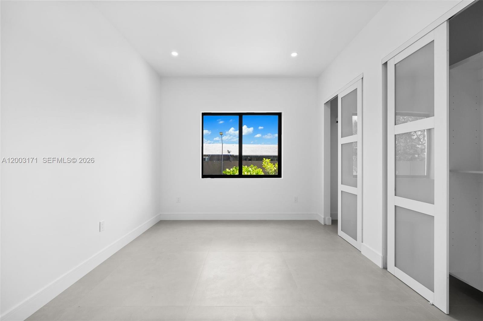 29705 Southwest 187th Avenue Homestead, FL 33030 - Photo 21 of 55 a view of an empty room
