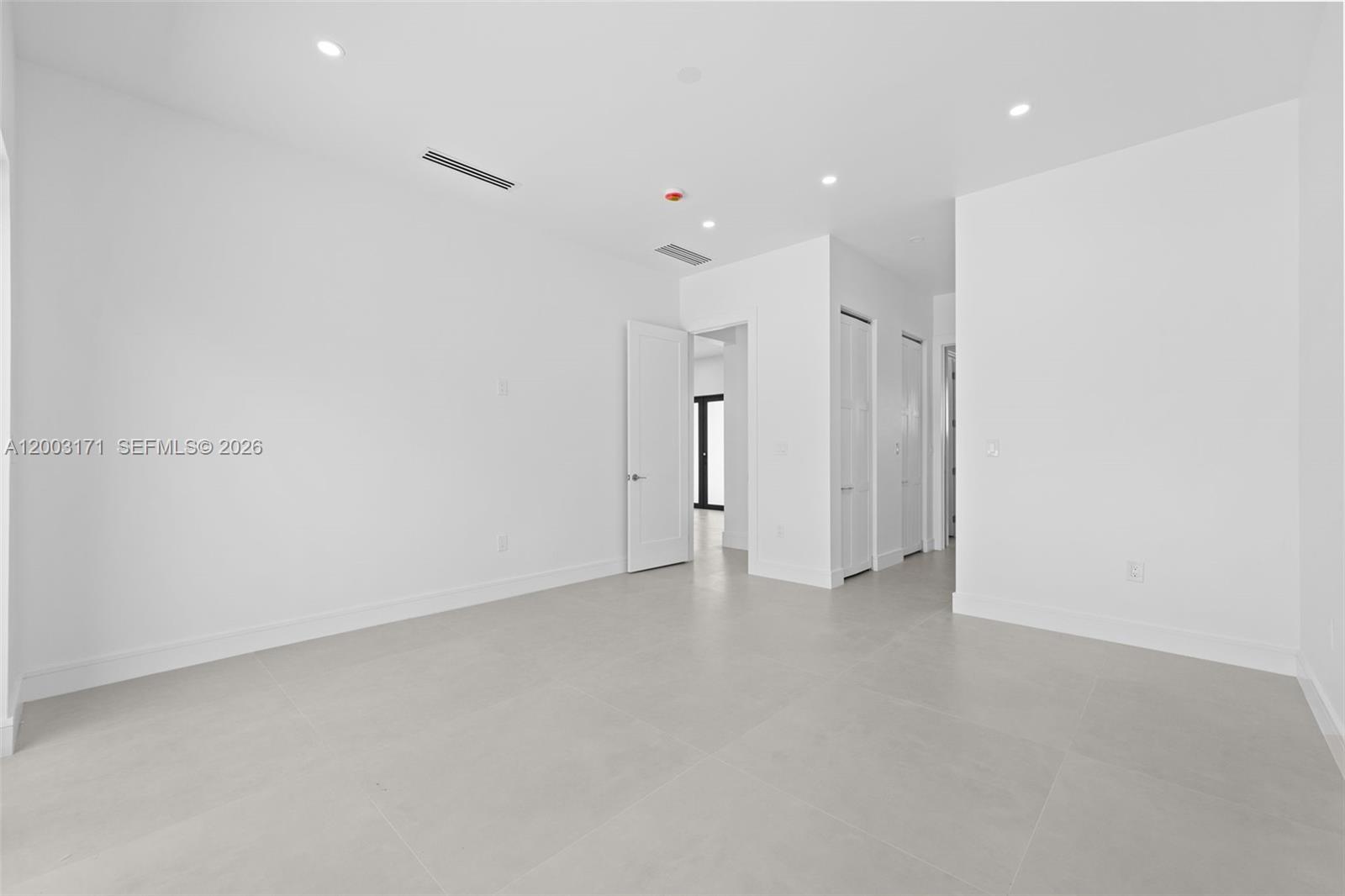 29705 Southwest 187th Avenue Homestead, FL 33030 - Photo 28 of 55 a view of an empty room
