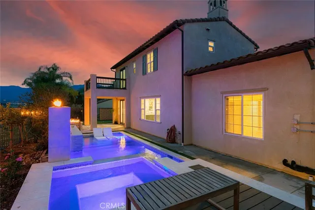 a view of a pool with a yard