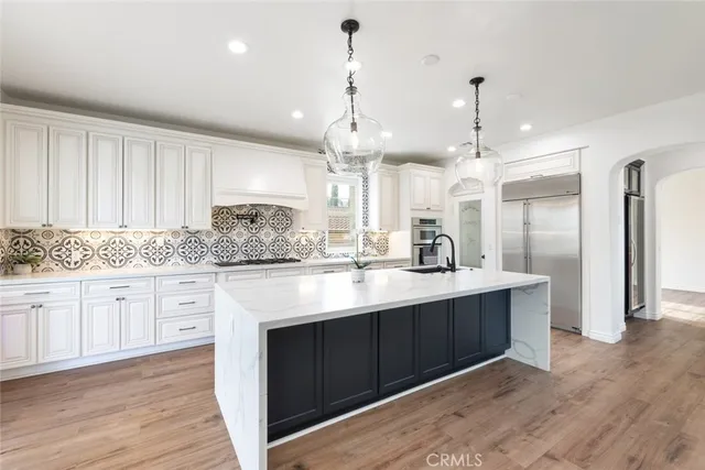 a view of a big room with windows