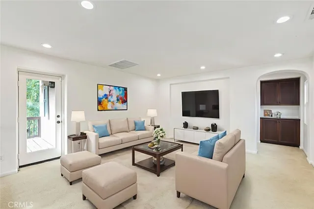 a view of swimming pool with outdoor seating and city view