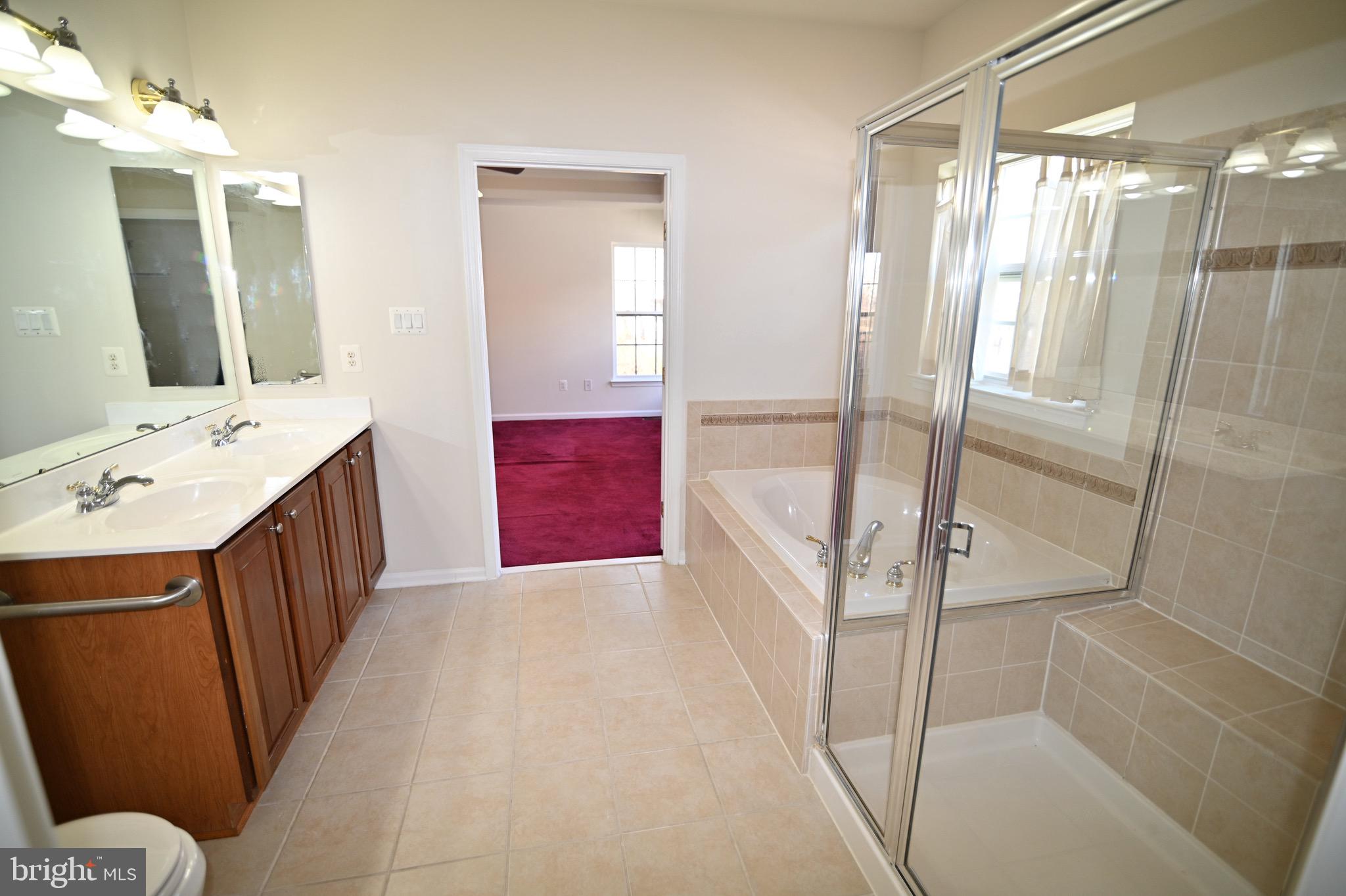 9802 Hillandale Way, Unit 23 Bowie, MD 20721 - Photo 14 of 28 Master Bath / Main Level