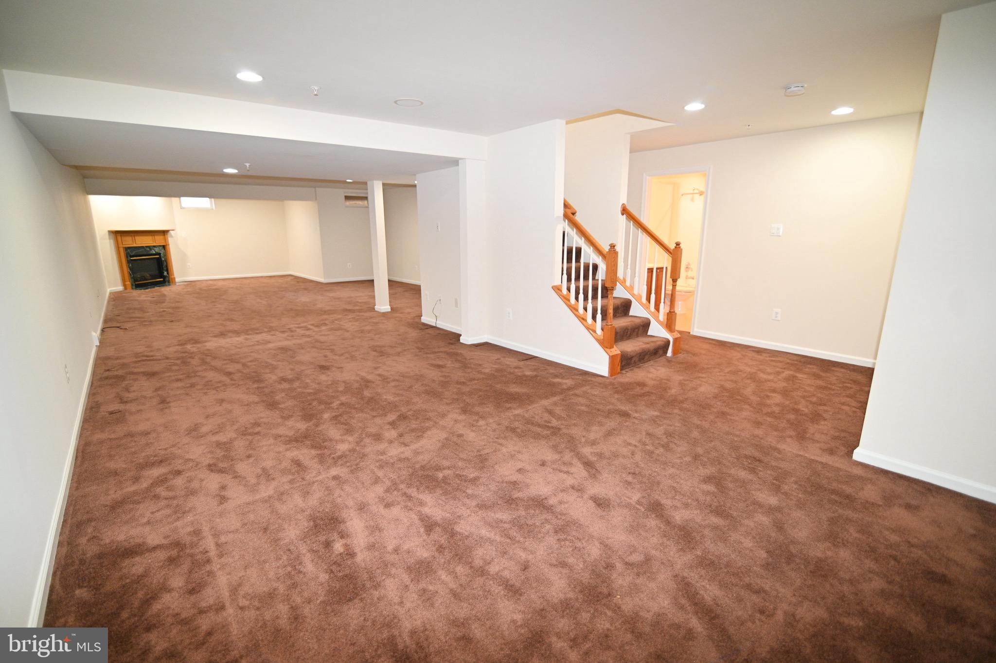 9802 Hillandale Way, Unit 23 Bowie, MD 20721 - Photo 23 of 28 Full Basement w/ Fireplace - Lower Level