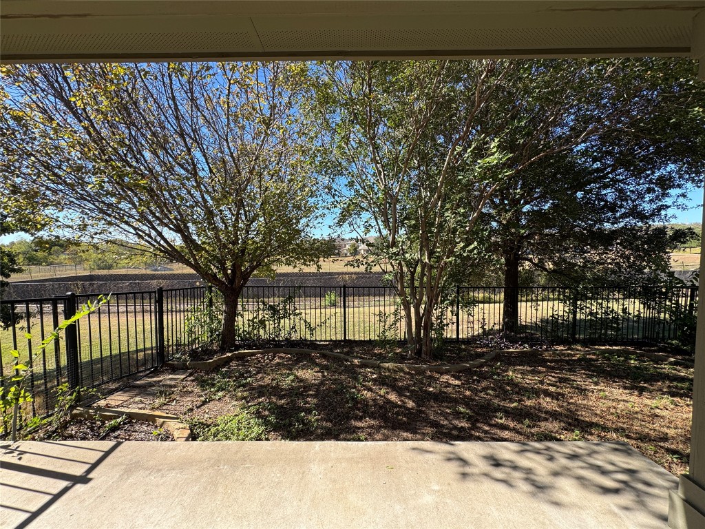 3101 Davis Lane, Unit 8703 Austin, TX 78748 - Photo 20 of 23 a front view of a house with a yard