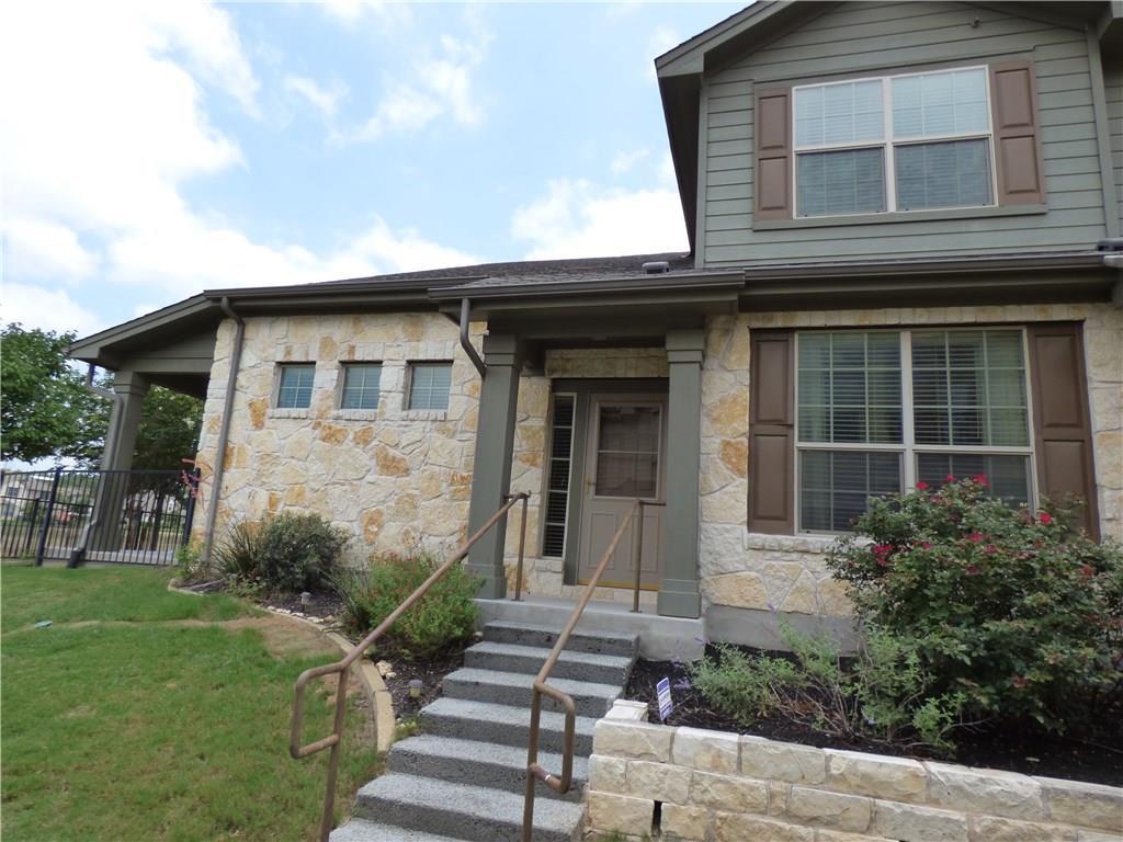 3101 Davis Lane, Unit 8703 Austin, TX 78748 - Photo 2 of 23 a front view of a house with garden