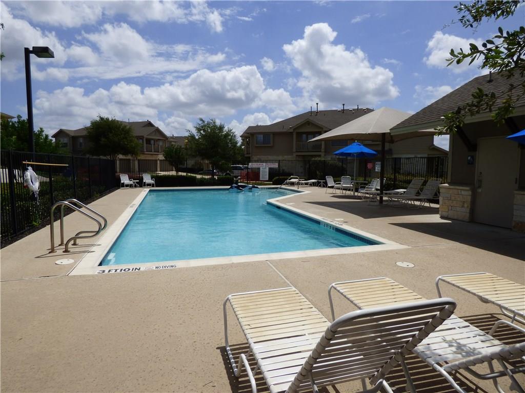 3101 Davis Lane, Unit 8703 Austin, TX 78748 - Photo 23 of 23 a view of a swimming pool with sitting area