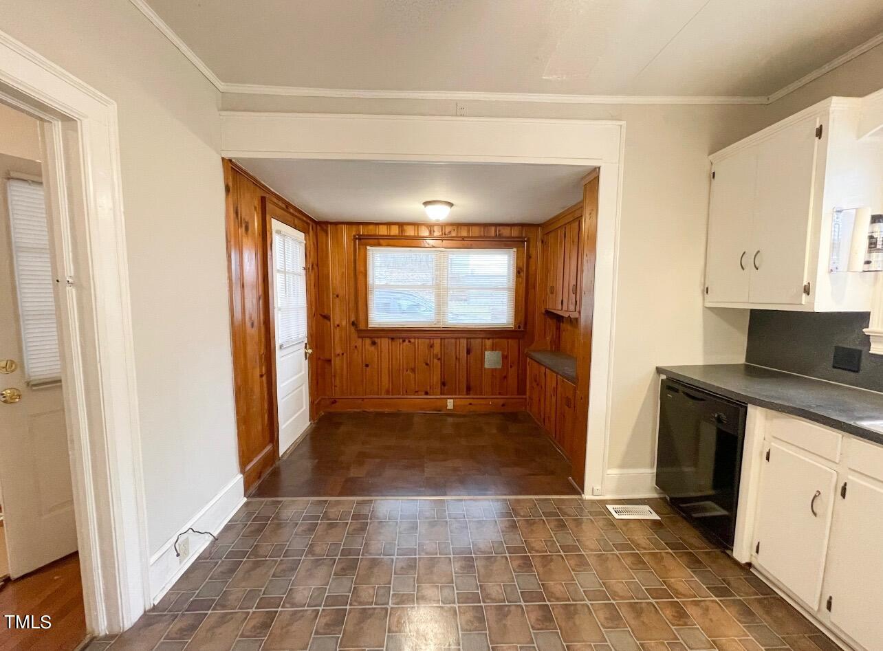 237 Wesleyan Heights Road Roxboro, NC 27573 - Photo 15 of 39 a view of a kitchen from the hallway