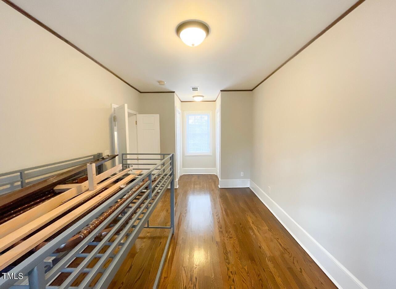 237 Wesleyan Heights Road Roxboro, NC 27573 - Photo 21 of 39 a view of a room with wooden floor
