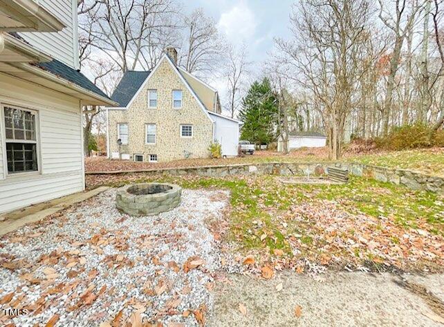 237 Wesleyan Heights Road Roxboro, NC 27573 - Photo 31 of 39 a view of a house with snow on the ground