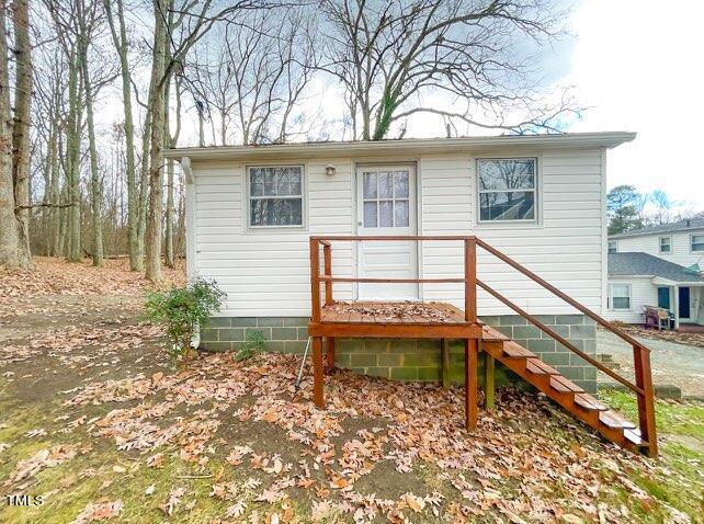237 Wesleyan Heights Road Roxboro, NC 27573 - Photo 34 of 39 a view of house with a yard